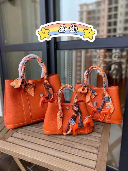 

classic garden party tote bag lichee grain layer cow leather garden bag women's handbag guangzhouo7v5 q7vo