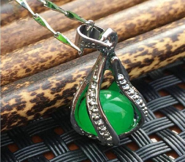 

natural oil green malay jade hollowout pendant with ship ping x1102142813, Silver