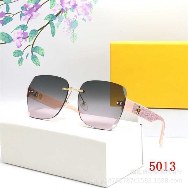 

50% off wholesale of sunglasses new fashion versatile street shooting for women's colorful frameless sunglasses 5013 network red anchor, White;black