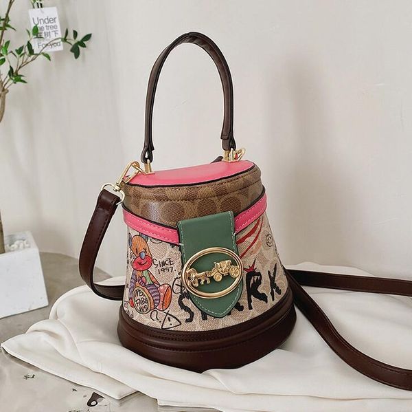 

factory wholesale ladies shoulder bags 2 colors street popular totem bucket bag trend western-style printed handbag thickened leather mobile