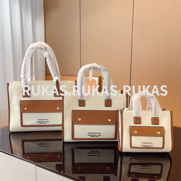 

2023 handbag new large capacity bag female minority single shoulder document female bag canvas tote bag work fashion simple commute tote bag