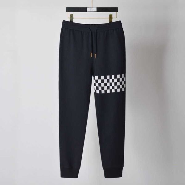 

originally-designed high-grade asymmetric chessboard checkered trousers for men and women casual sports pants fashion, Black;brown