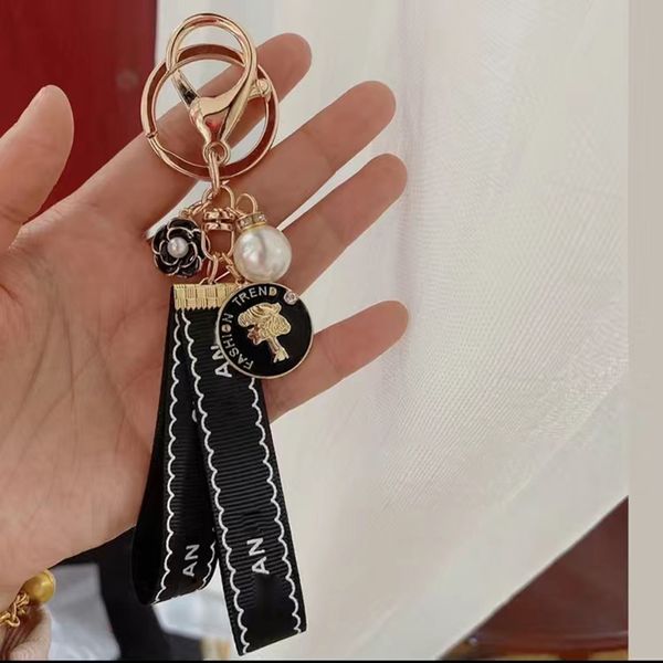 

keychain designer keychain luxury bag charm fashion trend car keyring flower pearl keychain giveaway gift, Silver