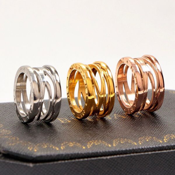 

brand ring hollow out classic luxury 18k gold and silver rose gold for women and men shine designer jewelry titanium steel letter ring coupl