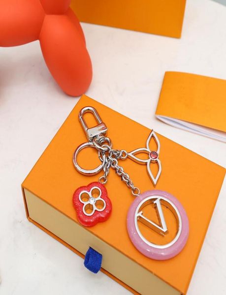 

stylish keychain luxury designer keys pendant gold ring key buckle classic letter flower whole keychains bag orna51099272256, Slivery;golden