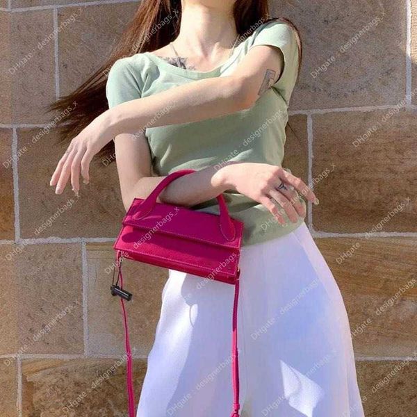 

same mini hong bags luxury luxurys handbag hand designer holding slant cross smal ltotes red bag crowd wallet purses