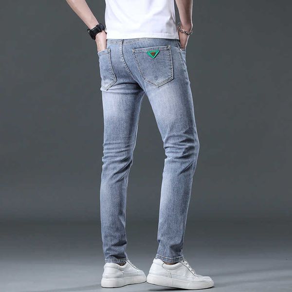 

on focusing high-end light luxury jeans for men in autumn and winter 2022 slim fitting elastic casual korean brand pants, Blue