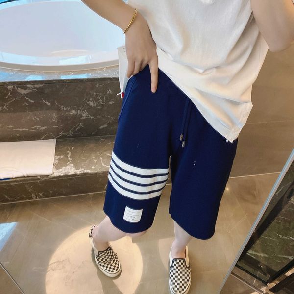 

men's and women's shorts in 2023 summer new fashion designer brand thom ins net red stripe casual four bar ice silk hemp knitted v, White;black