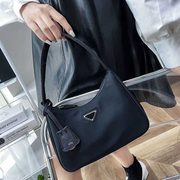 

prads designer luxury bags for womens triangles pattern crossbody handbags totes bag purses shoulder cleo hobo pravda mens multicolour nylon