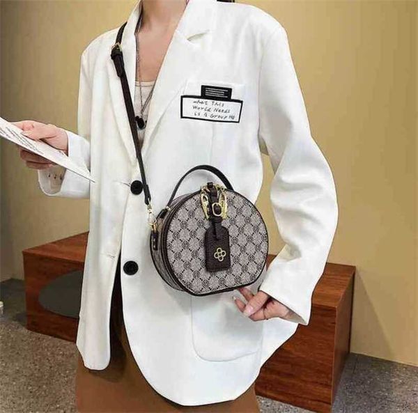 

luxury designer new women's handbag women's sense cake printed round