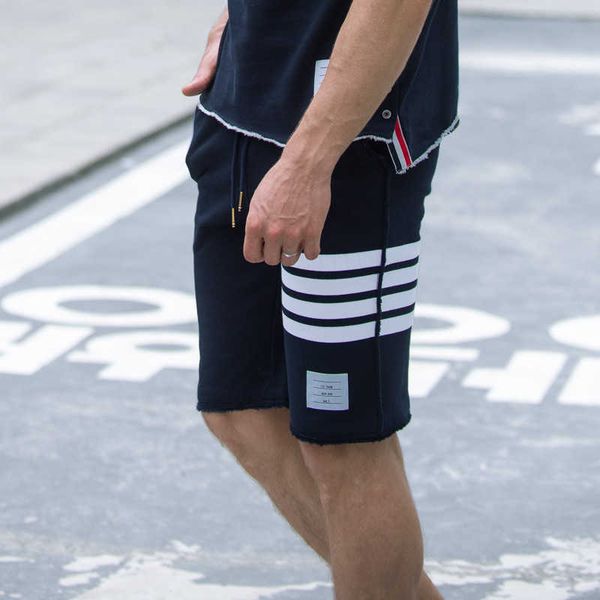 

men's and women's shorts in 2023 summer new fashion designer brand thom trend 5 point casual sports pants fringed hem beggar suit, White;black