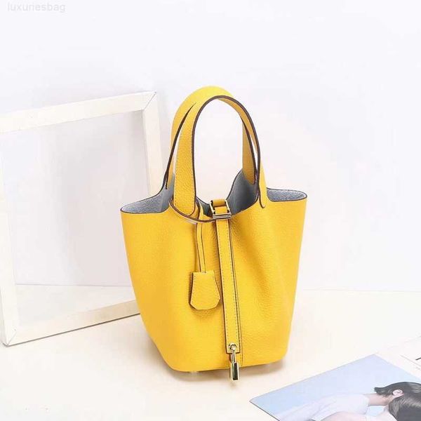 

designer luxury bag h first layer litchi grain leather bucket brand fashionable gold buckle kraft vegetable basket women's bagt73umqj8