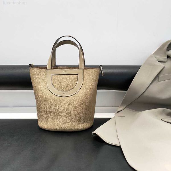 

designer luxury vegetable style simple genuine leather single layer cowhide wide shoulder strap bucket horseshoe basket portable women'