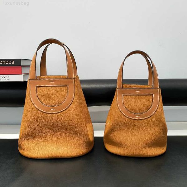 

designer luxury vegetable style simple genuine leather single layer cowhide wide shoulder strap bucket horseshoe basket portable women'