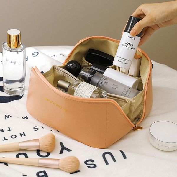 

the factory has a large-capacity hand-held cosmetic bag for women to carry