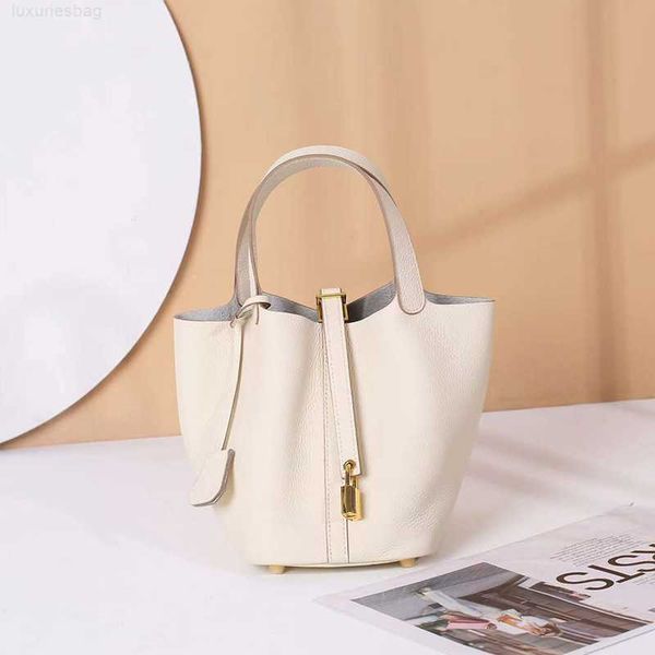 

designer luxury bag leather vegetable basket niche design togo layer cowhide women's large capacity portable bucket bagrolsfrr4 picotin