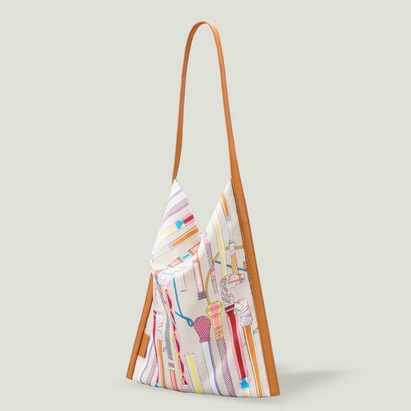 

new high capacity silk bread bag fashion cartoon diagonal straddle shoulder bag commuter underarm bag small female bag 230406