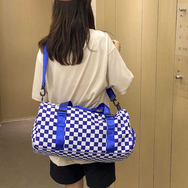 

duffle bags wet and dry separation short distance travel bag female hand luggage korean version diagonal boarding small bag 230406