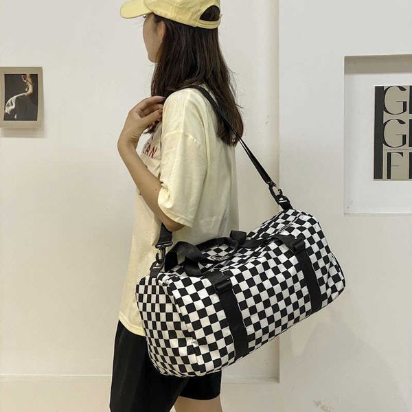 

duffel bags wet and dry separation short distance travel bag female hand luggage korean version diagonal boarding small bag 230406