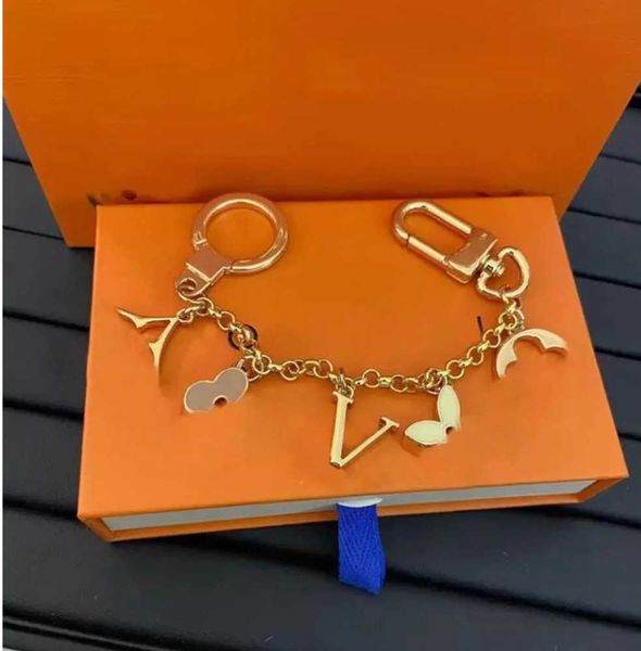 

keychains lanyards fashion brand letter designer metal womens bag charm pendant auto parts motion current 66ess, Silver