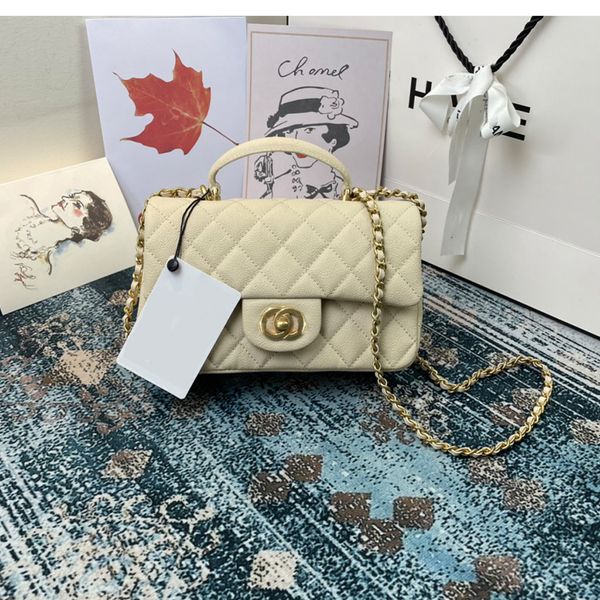 

portable high-end sense handle genuine leather women's bag mouth cover bag one-shoulder diagonal rhombic chain bag texture all-match go