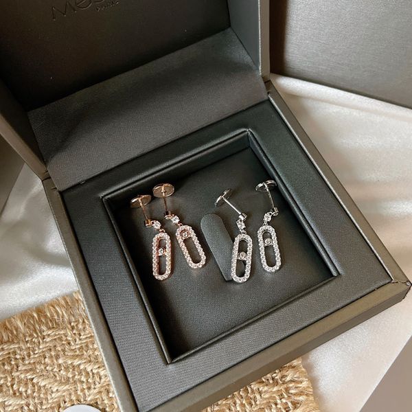 

stud sterling silver stud earrings for women; classic french brand moving stones holiday gift 230406, Golden;silver