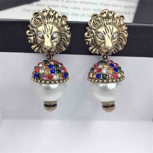 

earrings 2023 new 925 sterling silver pearl inlaid color diamond lion head earrings simple earrings factory direct sales 50% off, Golden