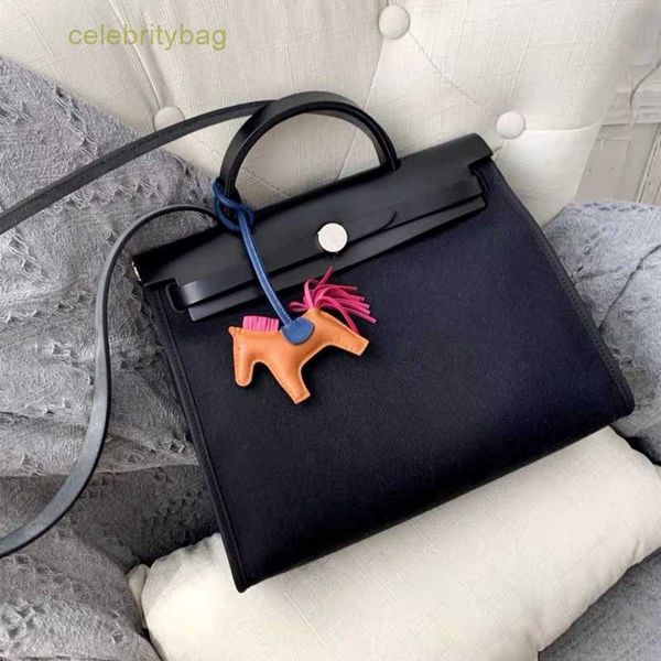 

designer kelys handbags hemrres 2023 new leather bag women's cowhide canvas contrast color hand one-shoulder cross-body mother has logo