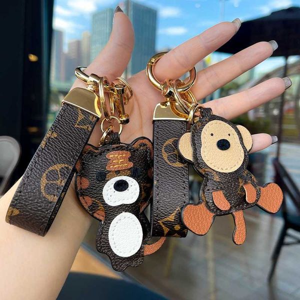 

chaopai tiger year keychain personalized female car couple fashion pendant cartoon bag, Slivery;golden