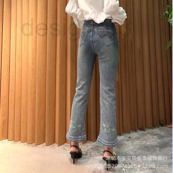 

women's jeans designer chic early spring 23 new style embroidered high waisted elastic micro horn denim capris for women ovd6, Blue