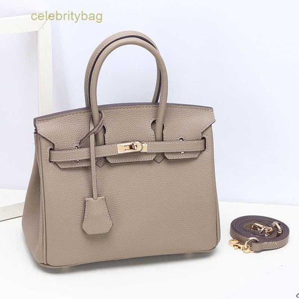 

designer kellies handbags hemres cowhide togo small grain women's leather fashion one shoulder hand texture has logo klrw