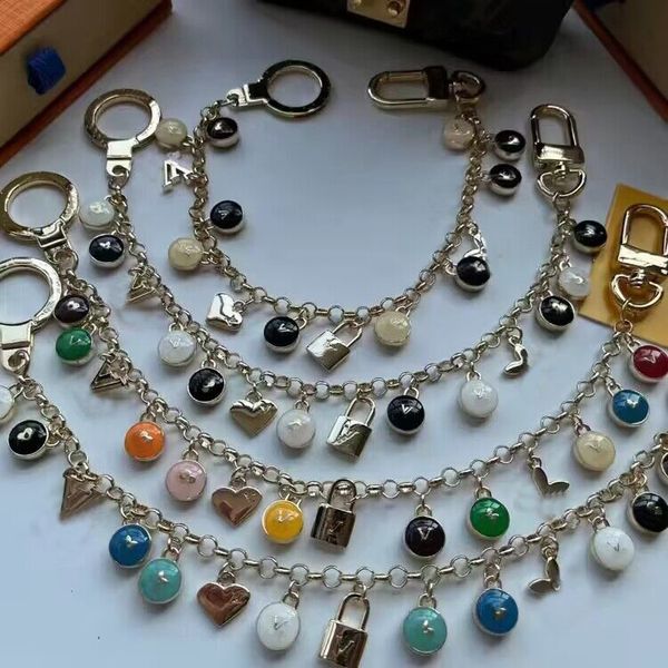 

luxurys designers keychain classic brand key buckle flower letter key chain bag ring handmade keychains men women bags pendant, Silver