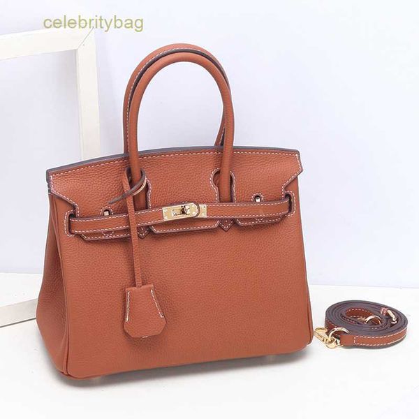 

designer kellies handbags hemres small grain cowhide togo women's leather fashion one shoulder hand texture 1 has logo tymg