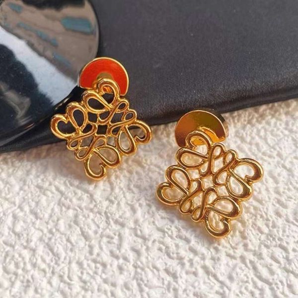 

Classic designer earrings loeve jewelry Luxury fashion jewelrys three-dimensional carved hollow pendant mooncake earrings fashionable sense female earring