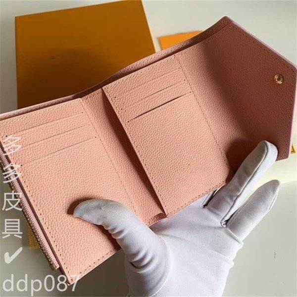 

classic short wallet embossed cowhide three fold small coin clip solid color