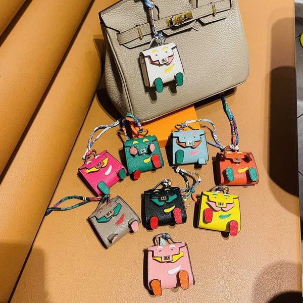 

same mini bag pendant cute little monster headset bag car key chain, Silver