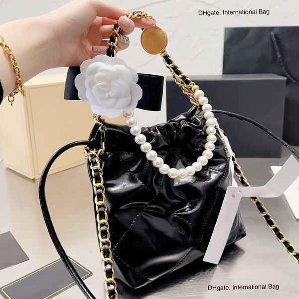 

briefcases 22bag series single shoulder crossbody smooth calf leather bucket drawstring opening with oversized capacity and iconic diamond m