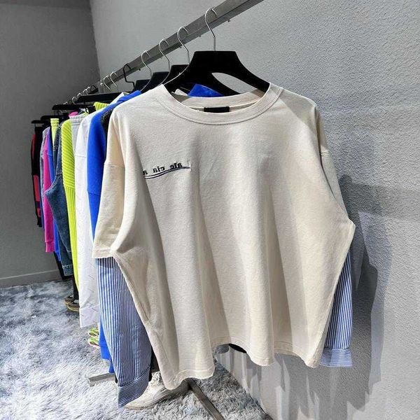 

2023 new designer womens t shirt high-end shirt high edition coke wave embroidery fake two piece panel long sleeve couple os top, White