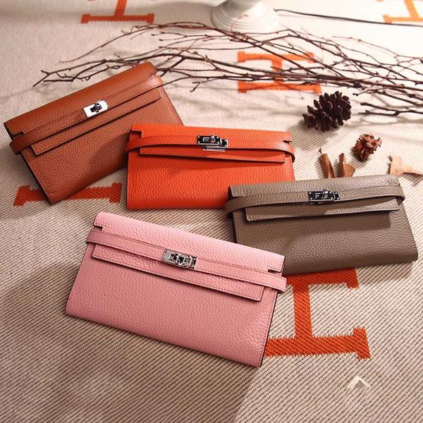 

leather women's wallet layer cowhide long three fold wallet litchi lock handbag