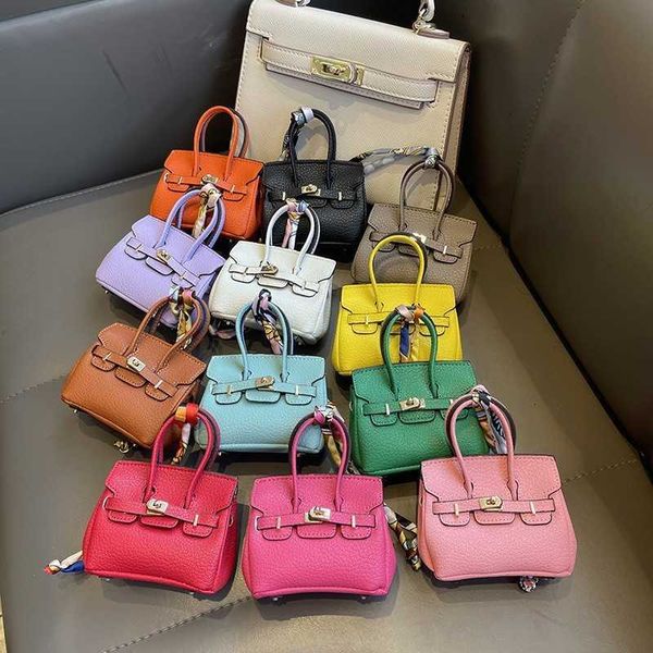 

mini bag pendant high-end mouth red headset car key chain price