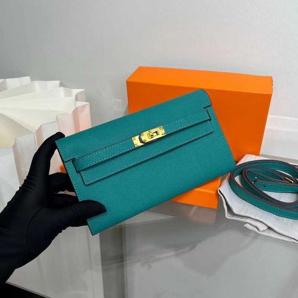 

2023 new purse layer cow leather gold buckle middle and long style handbag lady