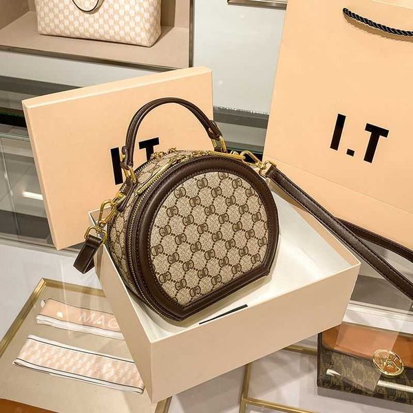

designer bag 2023 new bag women's fashion small round bag versatile print old flower round cake one shoulder oblique cross bag apple ro