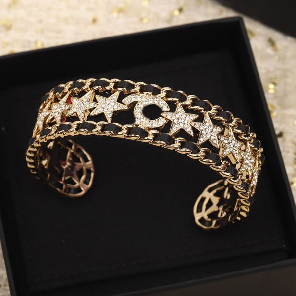 

2023 luxury quality charm bangle with diamond and black genuine leather hollow design star shape have box stamp ps7820a