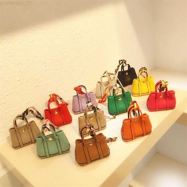 

fashion women's bag designer hand same mini garden pendant cute imitation leather earphone mouth red fashion car key chain