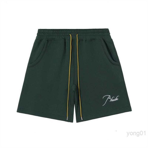 

terry short premium with rh signature script embroidered on the front featuring twin side pockets and a custom rhude chevron back pocket ext, White;black