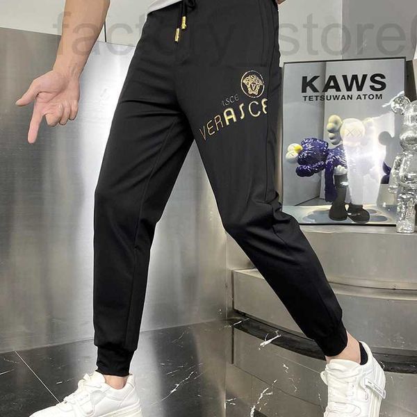 

men's tracksuits designer casual pants, mid waist, beautiful head, embroidered small leg european fashion brand sports leggings xj3x, Gray
