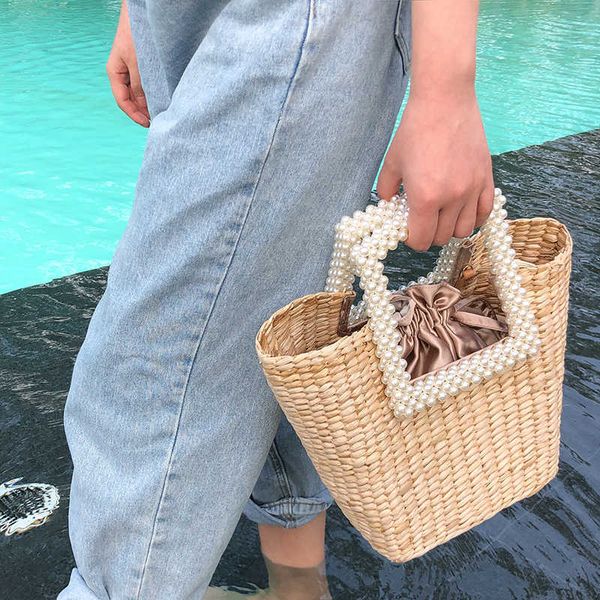 

fashion pearls handle rattan women handbags luxury chains wicker woven shoulder crossbody bags lady summer beach bali straw bag 230412