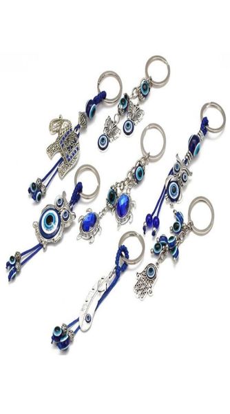 

whole fashion animal butterfly evil eyes keychain glass key chain glass blue eye pendant ornament keychains3758658, Silver