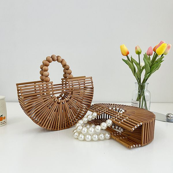 

evening bags handmade bamboo handbag pearl handle design women hollow out beach bag summer vacation woven straw bag female bag 230414