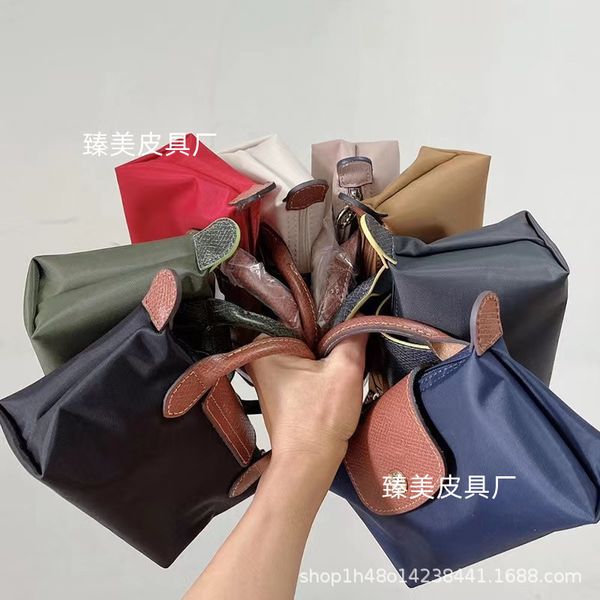 

evening bags mini dumplings package 2023 single handle the cognac color leather lapbags 230414